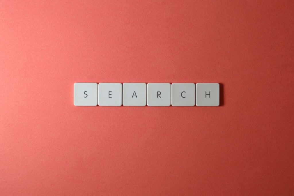 Mastering the First Impression: Your intriguing post title goes here White keyboard keys spelling 'search' on a bold red surface, conceptual design with copyspace.