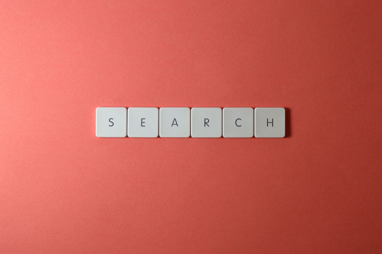 Mastering the First Impression: Your intriguing post title goes here White keyboard keys spelling 'search' on a bold red surface, conceptual design with copyspace.